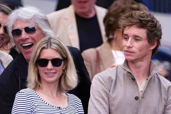 Singer Jon Bon Jovi, Actor Eddie Redmayne and Hannah Bagshawe attend the Men's Singles Final match between Taylor Fritz of the United States and Jannik Sinner of Italy on Day Fourteen of the 2024