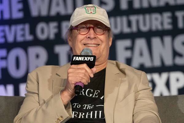 Chevy Chase falls off stage at 'National Lampoon's Christmas Vacation' event