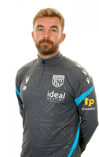 A photo of Albion first team coach James Morrison in the 2025/26 grey training kit