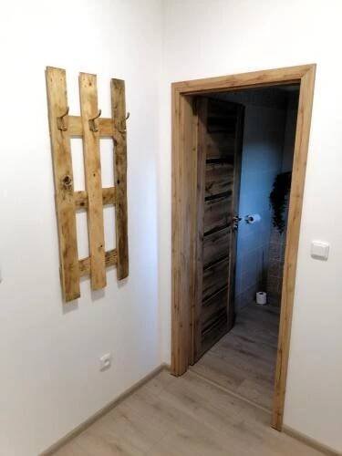 a room with an open door and a hallway at Víno Andrusiów in Znojmo