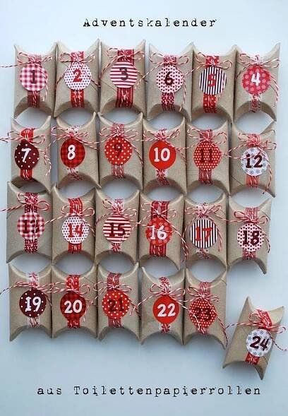 an image of a calendar made out of toilet paper rolls with numbers and hearts on them