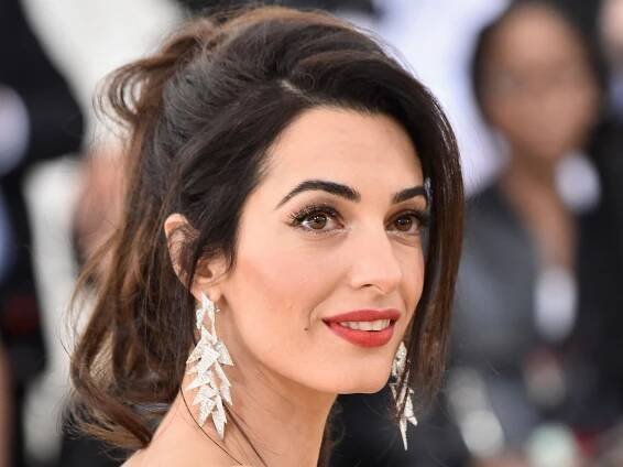 Amal Clooney divides HELLO! readers with style husband George brands 'eccentric'