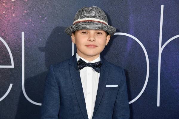 Javon Walton in fedora and bowtie