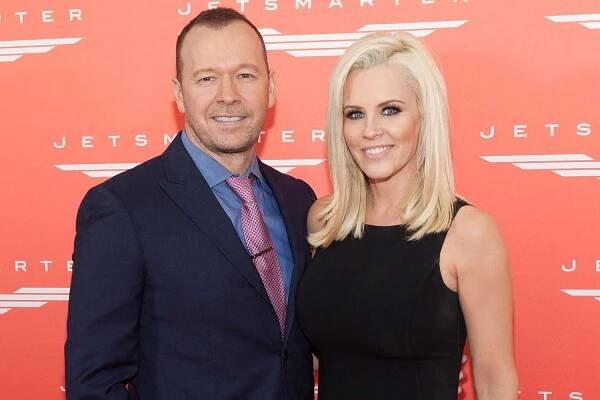 Jenny McCarthy and Donnie Wahlberg join Private Jet app to celebrate the launch of new Chicago routes at Chicago Executive Airport on March 4, 2016 in Wheeling, Illinois.