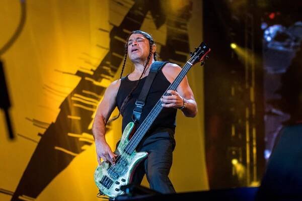A photo of Robert Trujillo playing live with Metallica.
