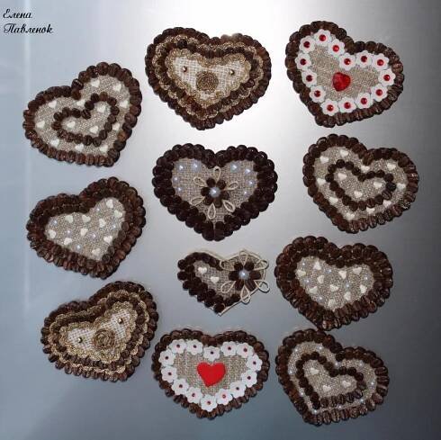 there are many heart shaped cookies on the table