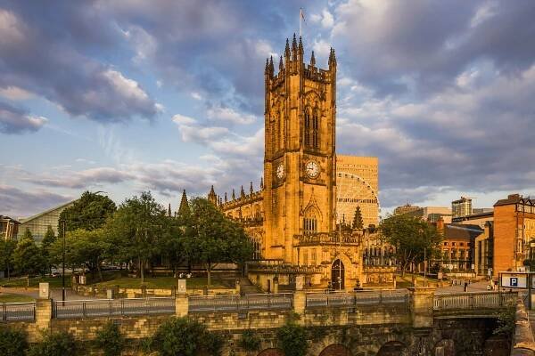 Historic Manchester Cathedral with its Gothic architecture and large stained glass windows