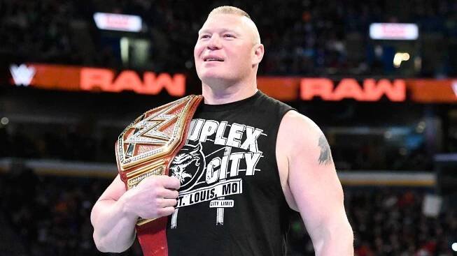 Powerhouse WWE Athlete, Brock Lesnar, in Action Wallpaper