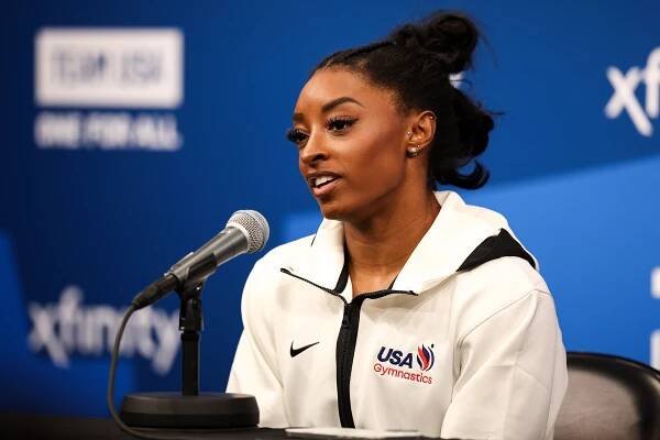 Simone Biles speaking to the media after being selected for the 2024 U.S. Olympic Women's gymnastics team in Minneapolis, Minnesota
