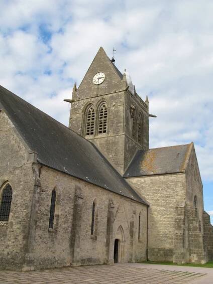 Sainte
Mère
Église 
 The church and its parachute memorial portrayed in the movie The Longest Day