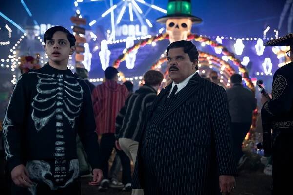Isaac Ordonez as Pugsley Addams, Luis GuzmaÌn as Gomez Addams in Season 2 of "Wednesday."