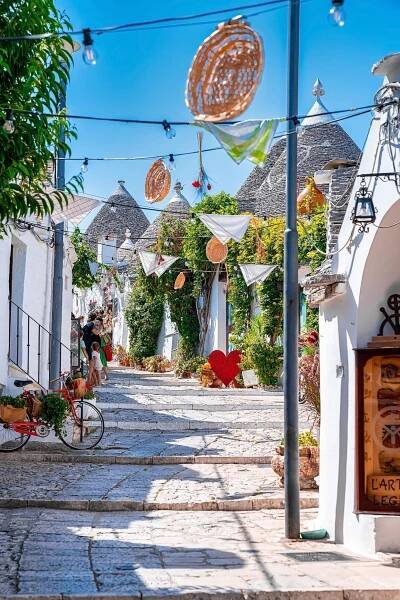 Sunny Street in Alberobello, Puglia with Trulli Houses
