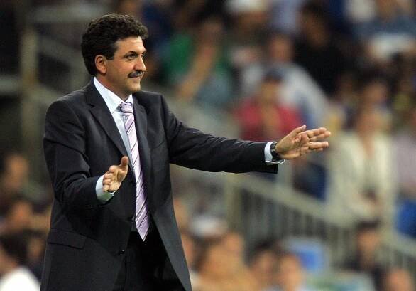Real Madrid coach Mariano Garcia Remon gestures during a Champions League game at the Santiago Bernabeu in September 2004.