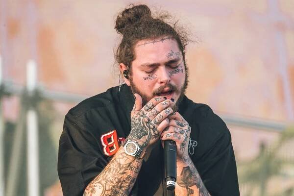 Post Malone male bun style.