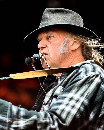 Neil Young takes aim at Spotify CEO, big banks