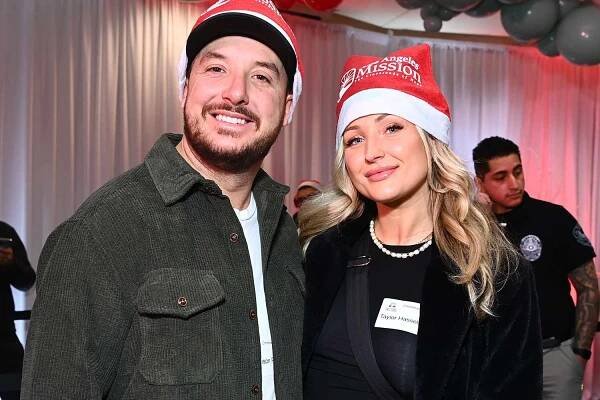 Madison Fiore and Taylor Ann Hasselhoff volunteer at the Los Angeles Mission's 87th Annual Christmas Celebration at Los Angeles Mission