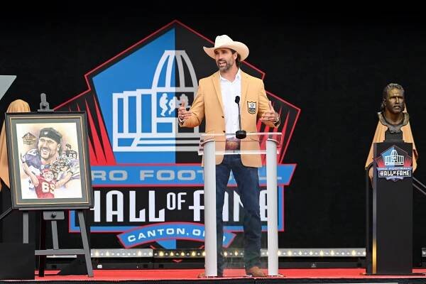 Jared Allen speaks during the 2025 Pro Football Hall of Fame Enshrinement Ceremony at Tom Benson Hall of Fame Stadium on August 02, 2025 in Canton, Ohio.
