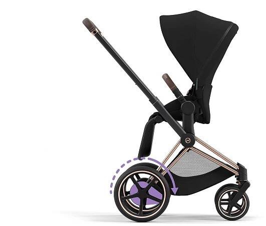 Pram with black seat and copper frame, side view.