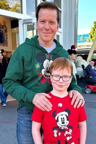 Jeff Dunham and son Jack Dunham pose for a photo together at Disneyland in December 2024.