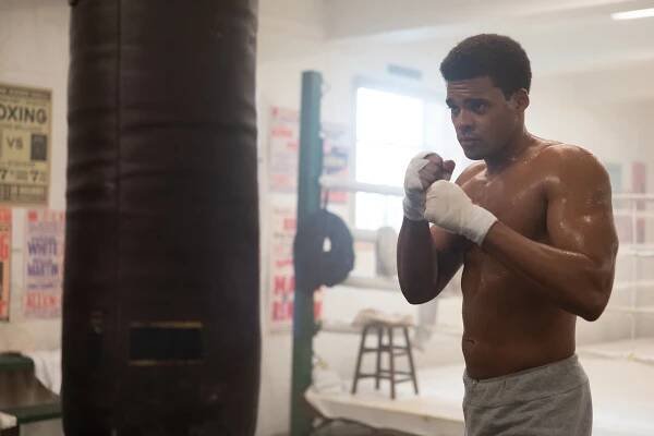 Deric Augustine as Cassius Clay.