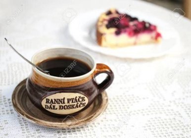 Cup Of Coffe With Fruit Cake In Background Motto Ranni Ptace Stock Photo Picture And Royalty Free Image Image 106632993
