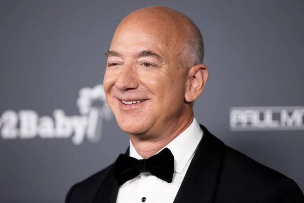 Jeff Bezos May Bid on Washington Commanders With Jay-Z