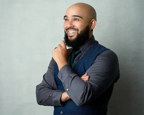 Mitchell Pinnick Posing for a Personal Branding Photo Shoot in Studio With Eric Campbell Photography mens headshots