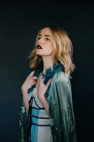Willa Fitzgerald wears vintage cape and dress from NY Vintage and URSA MAJOR rings.