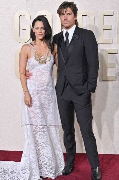 Riley Keough and Ben Smith-Petersen attend the 81st Annual Golden Globe Awards on January 07, 2024 in Beverly Hills, California.
