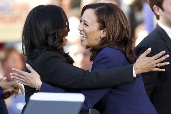 California Senator Kamala Harris greets her sister, Maya, after Harris launched her presidential campaign at a rally at Frank Ogawa Plaza in Oakland, Calif