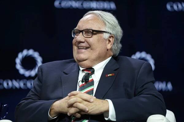Howard Graham Buffett smiling seated at an event with a Concordia backdrop