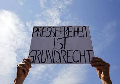 A sign reads 'Press freedom is a fundamental right' at a Berlin protest in support of Netzpolitik.org, which was accused of disclosing a state secret. Germany suspended the investigation. (Reuters/Fabrizio Bensch)