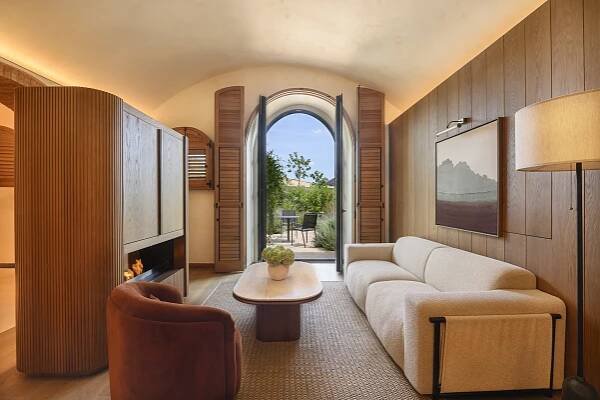 Hotel room with patio view.