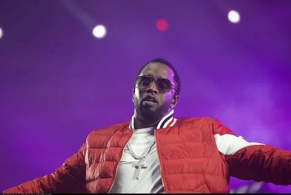 Sean Combs Rocks the Stage in Red