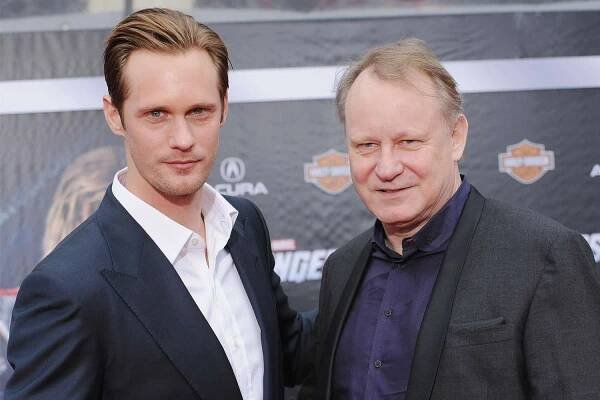 Alexander Skarsgard and father actor Stellan Skarsgard arrive at the Los Angeles Premiere of "The Avengers" at the El Capitan Theatre on April 11, 2012 in Hollywood, California
