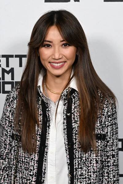 Brenda Song with long, slightly layered hair
