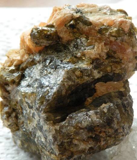 Unknown, many crystals (most on other sides) 1 to 1.5 cm various colours, transparent to opaque.