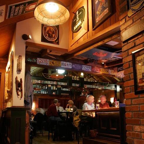 Customers enjoying handcrafted cocktails and wine at the bar