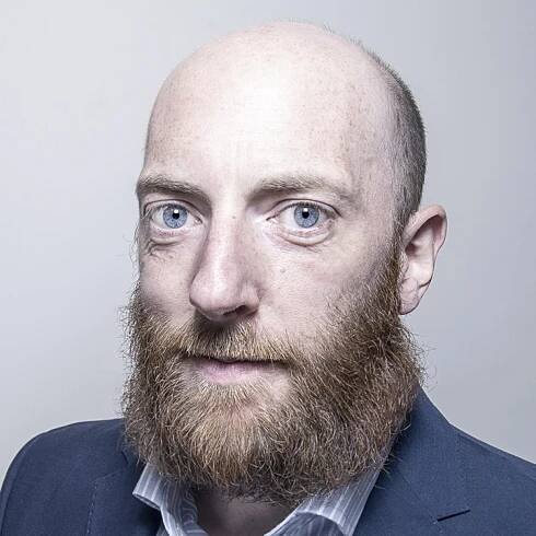A profile picture of Chris White.