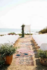 A Bohemian Wedding Trend We're Loving: Ceremony Aisles With Rugs