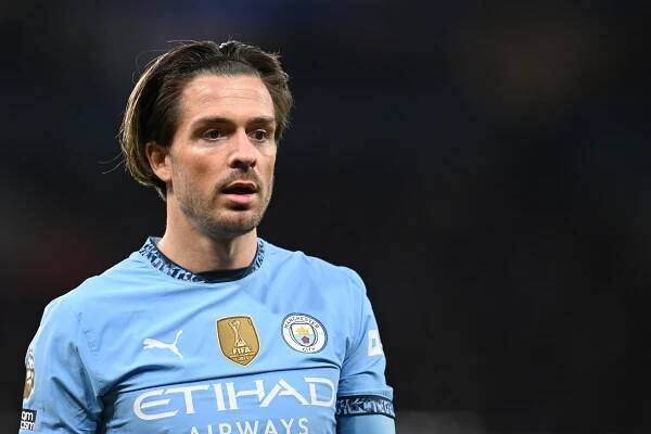 Jack Grealish of Manchester City in a soccer jersey.