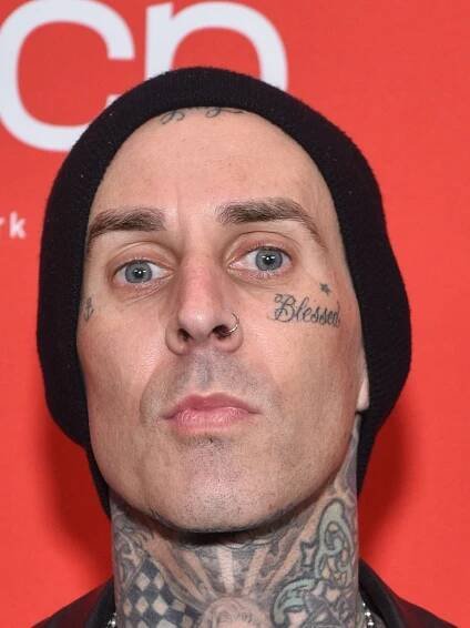 Travis Barker’s Madame Tussauds Wax Figure Is Scary Realistic — See Photos