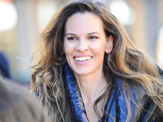 Hilary Swank, 49, wows in wetsuit following baby twins' arrival in fun new beach video
