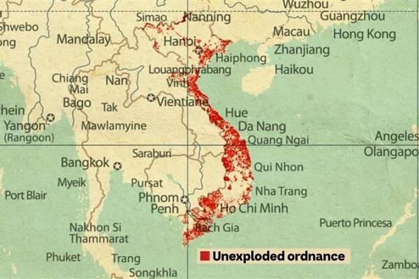A faded map of Vietnam, showing huge parts blanked out in red.