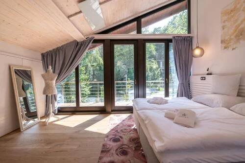Postel nebo postele na pokoji v ubytování Resort CATTALEYA