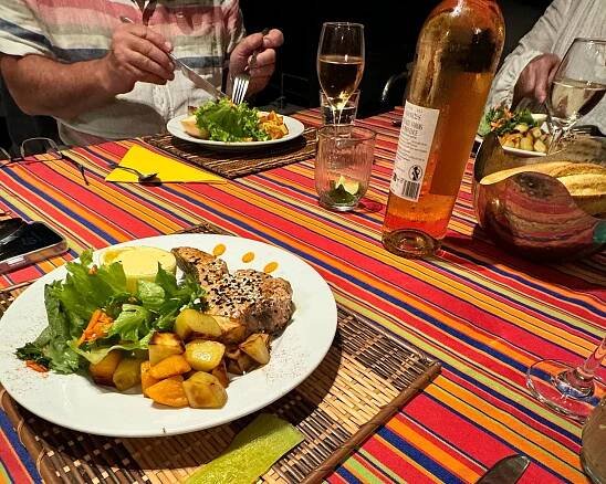 dinner table plate setting on a dream cabin charter