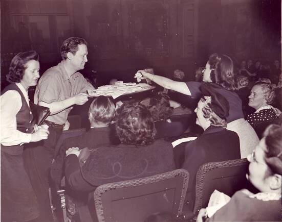 Ray Mayer &  Edith Evans serving sandwiches for Mr Big - 1941