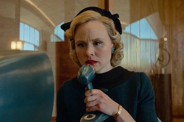 Myrtle (Alison Pill) talks on a Viddicon in a scene from 