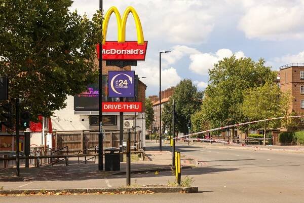 Crime scene on Old Kent Road near a McDonald's.