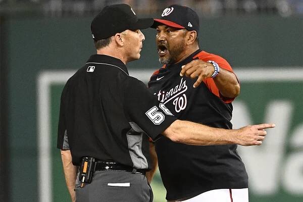 Nationals manager Dave Martinez argues with umpire Dan Iassogna during the 10th inning of Friday's game against the Phillies.